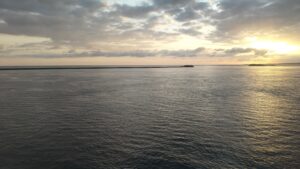 Sunrise over the Cherbourg breakwater, seen from the ferry on arrival