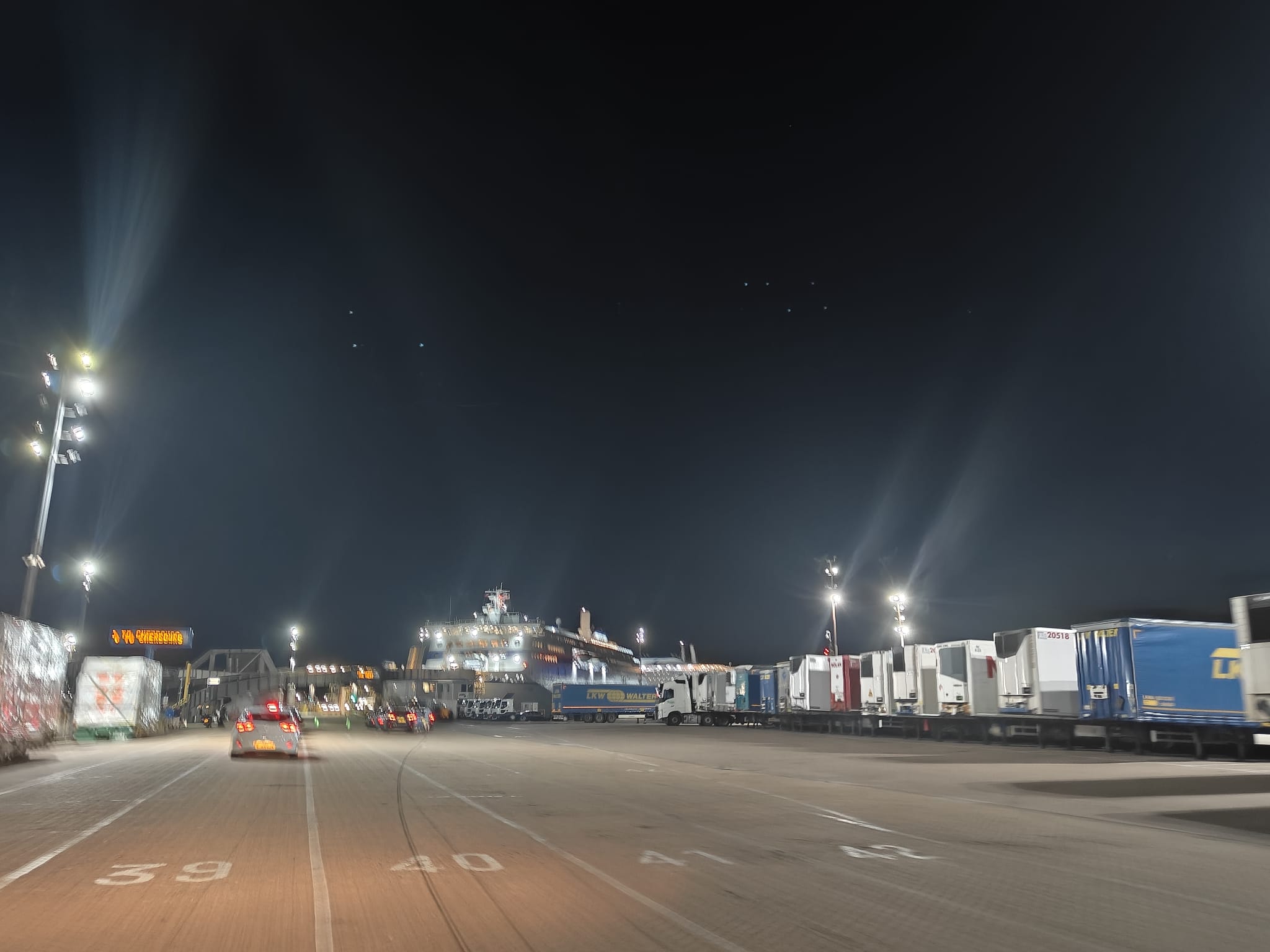 Portsmouth terminal boarding lanes signed for Cherbourg